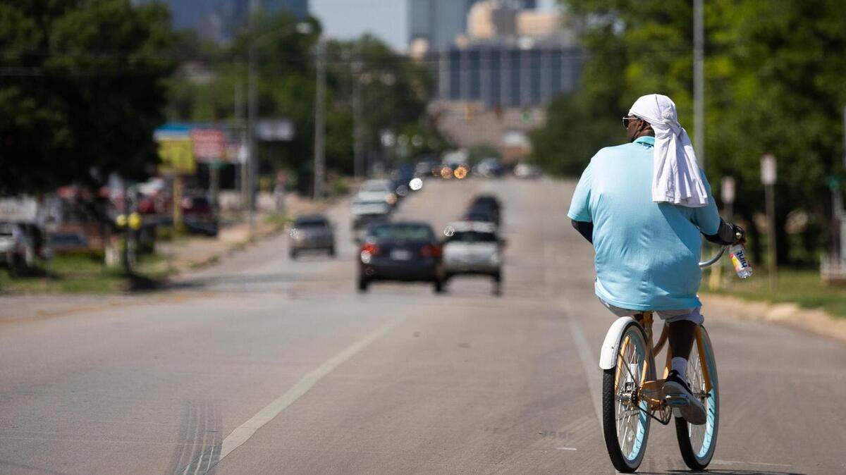 A cyclist rides along Hemphill Street May 5, 2022, in Fort Worth. A cyclist rides along Hemphill Street May 5, 2022, in Fort Worth.